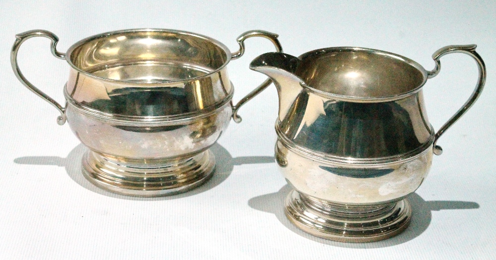 Silver cream jug and sugar bowl of almost globular shape, Birmingham 1941, 8½oz.