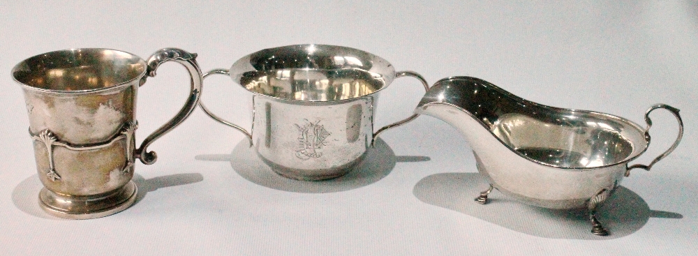 Silver sauce boat, a christening mug and a similar bowl, 11½oz.   (3)