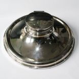 Silver capstan inkwell with moulded border, 'The Maude Ridout Trophy', with cut glass liner,