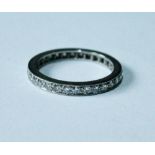 Eternity ring with eight-cut diamonds in white gold.