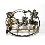 French silver parcel gilt belt buckle of Art Nouveau style with stylised convulvulus and leaves,