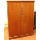 Edwardian mahogany Compactom wardrobe with two panel doors and fully-fitted interior, 126cm wide.