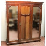 Edwardian three-door wardrobe with fitted centre, by A. Gardner & Son, Jamaica Street, Glasgow,