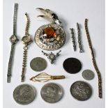 Two plaid brooches, various coins and other items.