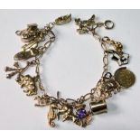 9ct gold charm bracelet. Condition Report 18g
