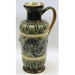 Doulton Lambeth blue and green stoneware jug with scrollwork decoration and applied rosettes, 'O',