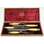 Thomas Turner five-piece carving set in a fitted oak case.