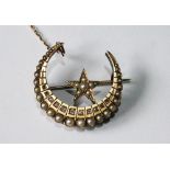 Victorian gold crescent brooch with a row of graduated diamonds and another, pearls, in gold.