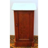 Victorian flame-cut mahogany pot cupboard with marble top, raised on a plinth base, 80cm high.