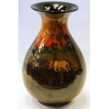 Royal Doulton vase decorated with a landscape of horses harrowing, 24cm high. Condition Report The