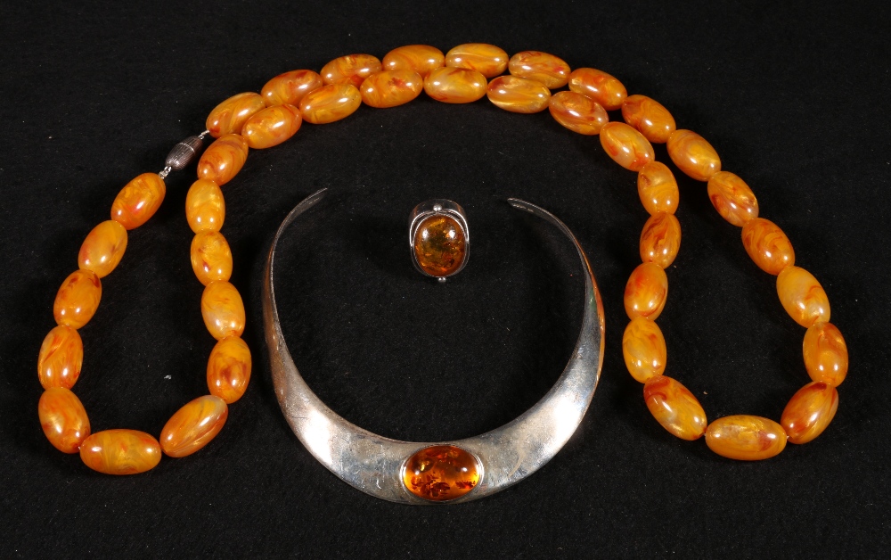 Large silver ring set oval amber,