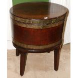 George III oval brass bound mahogany cellarette, with hinged lid, on square tapered legs,