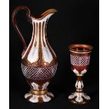 19th century Bohemian ruby and white overlaid ewer with gilt highlights, socle base and a matching