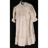 Fine lawn girls' dress with puff sleeves and covered buttons, a silk dress,