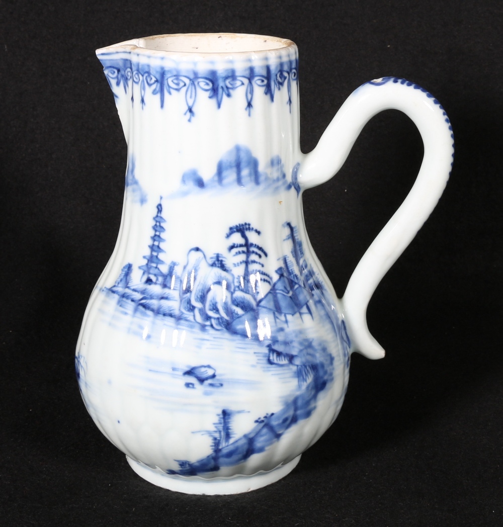 19th century Chinese blue and white jug with scroll handle and ribbed body decorated with a
