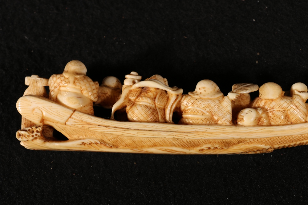A 19th century ivory carving of the Shichifukujin or gods of good fortune in a boat with a dragon - Image 4 of 5