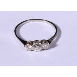 1930's platinum diamond solitaire three stone ring set with graduating round brilllant diamonds,