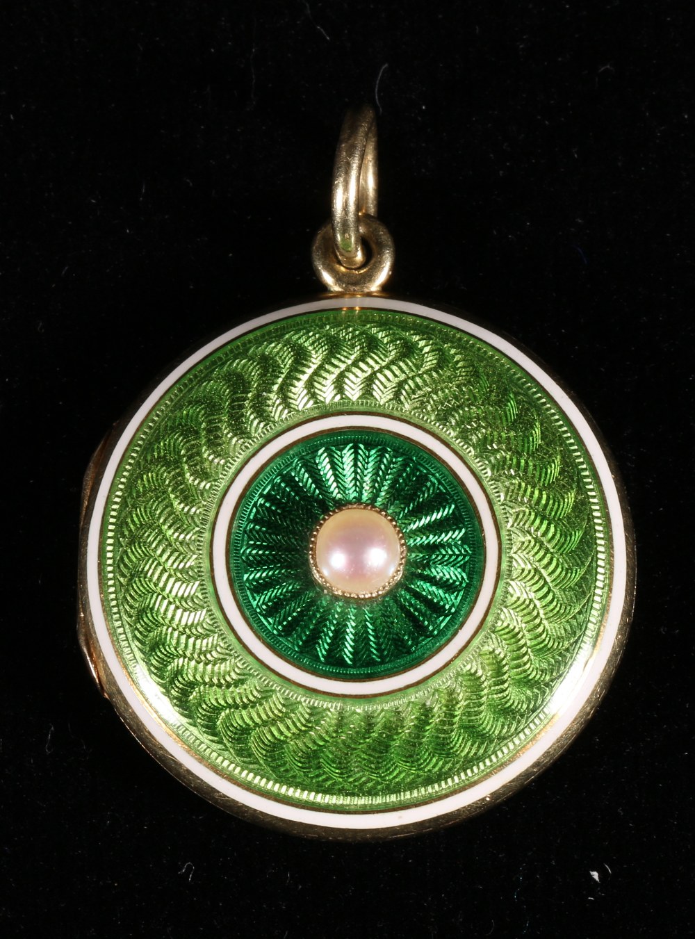 Edwardian circular enamel pearl set gilt locket with suspension ring. 25mm CONDITION REPORT: No