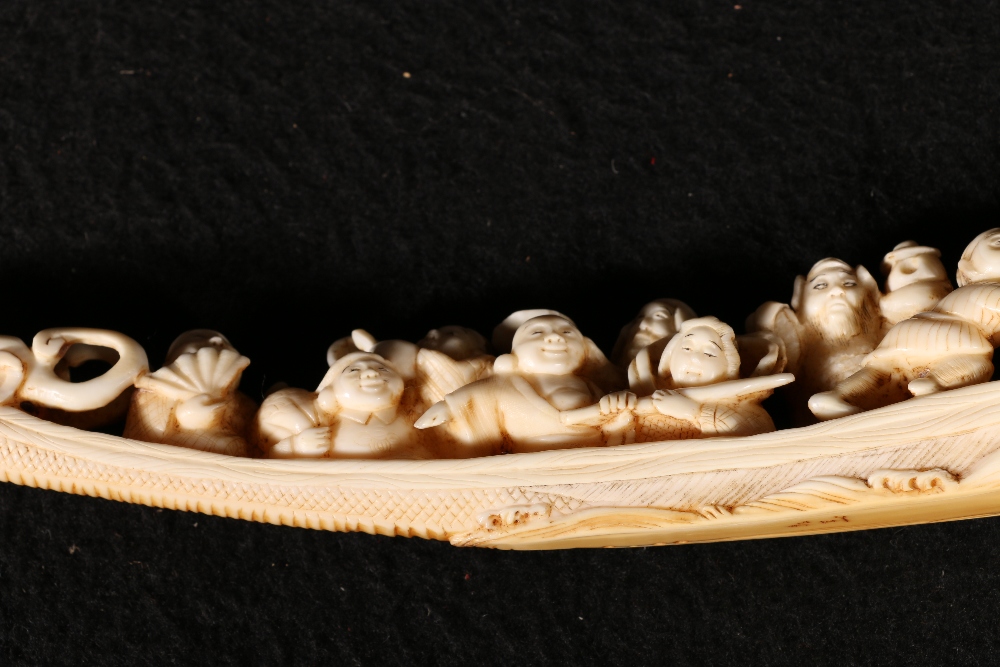 A 19th century ivory carving of the Shichifukujin or gods of good fortune in a boat with a dragon - Image 3 of 5