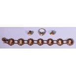 9ct gold bracelet set with seven cameos and a similar ring and earrings