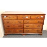 Early 19th century Lancashire chest with hinged top with five dummy drawers over four drawers with