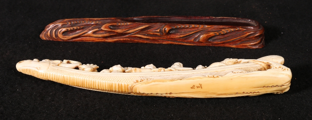 A 19th century ivory carving of the Shichifukujin or gods of good fortune in a boat with a dragon - Image 2 of 5