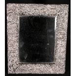 Edwardian silver easel mirror, the frame embossed with scrolling acanthus, Maker CD, 29.5cm x 24.