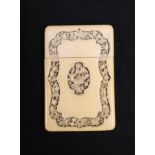 19th century carved ivory card case with central monogrammed panel within a deeply carved rose