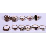 A collection of eleven 9ct gold gem set rings