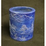 Early 20th century Chinese powder blue glazed brush pot, line decorated in low relief with buildings