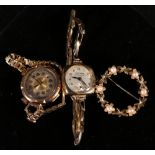 Two ladies 9ct gold watches (one on rolled gold bracelet) and a circular brooch with pearls in 9ct