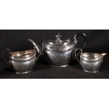 20th century three piece silver teaset by Wilson and Sharpe of oval form, Sheffield,