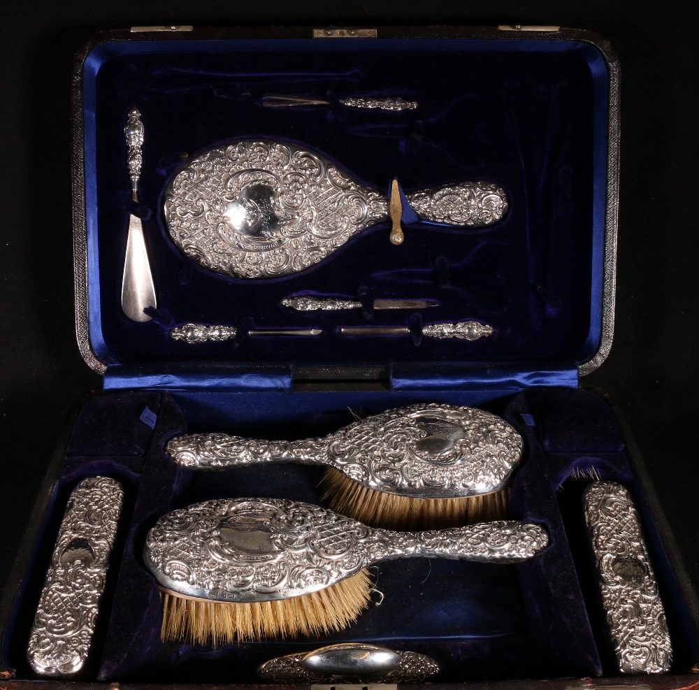 Edwardian silver dressing set comprising pair of hair brushes,