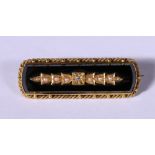 Victorian 15ct gold and enamel mourning bar brooch set with diamond point and seed pearls,