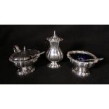 Silver four piece condiment set of scoll outline raised on a socle base