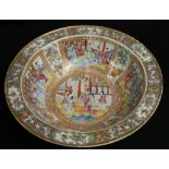 Canton famille rose wash bowl with heavy rim, the interior decorated with figure panel reserved on a