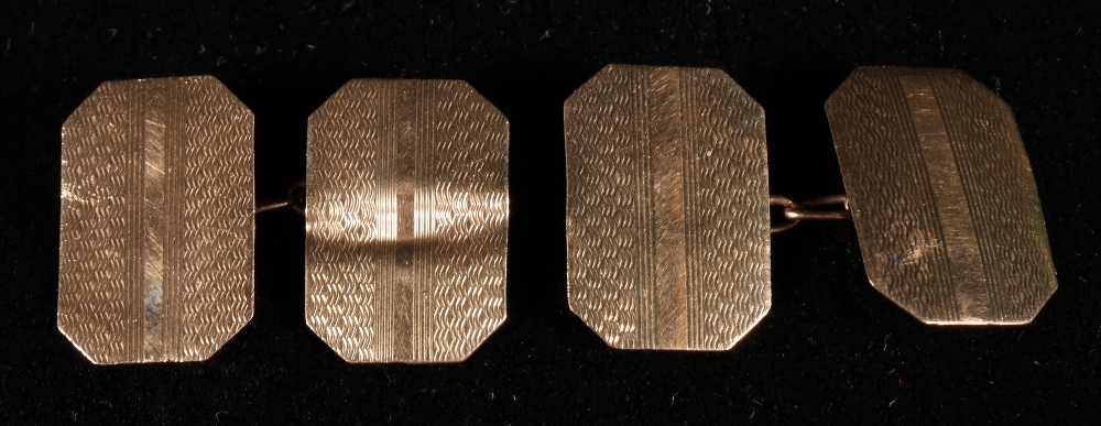 Pair of 9ct gold engine turned rectangular cufflinks CONDITION REPORT: 3.2g in weight.  One cufflink