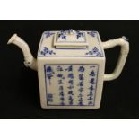 An interesting 19th century Chinese teapot of rectangular section with simple handle, the domed