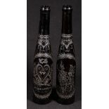 George III Scottish brown glass marriage bottles engraved with thistles, hearts, deer and figures,