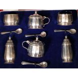 Silver six piece condiment set with faceted decoration, Edinburgh 1938, maker Hamilton & Inches,