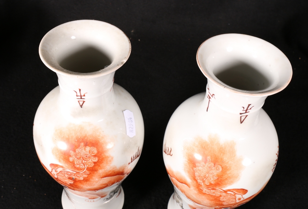 Pair of Chinese late 19th century / early 20th century vases decorated with shi shi dogs in an - Image 2 of 5
