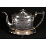 George III semi fluted oval silver teapot with floral band, initials in cartouches, Edinburgh 1802