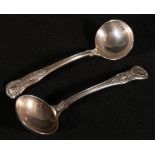 Pair of Victorian Kings pattern silver sauce ladles, engraved with crests and Baronets crown,