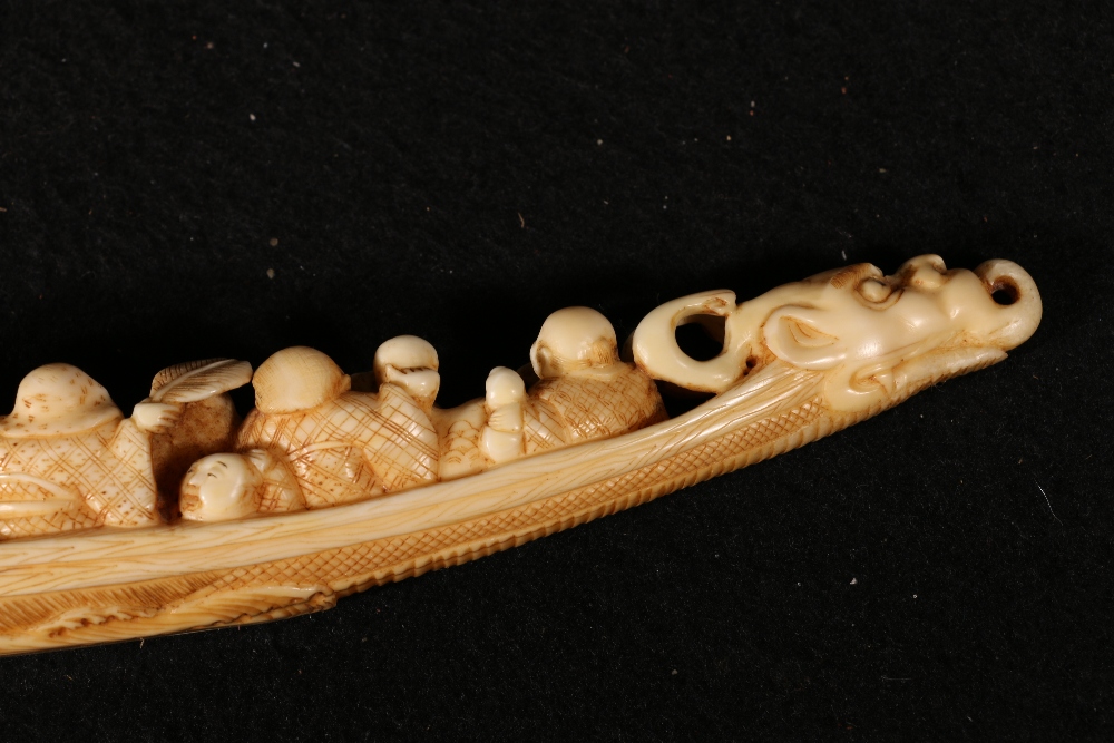 A 19th century ivory carving of the Shichifukujin or gods of good fortune in a boat with a dragon - Image 5 of 5