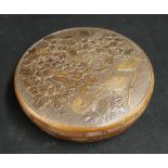 Japanese carved wooden bowl and cover, the top carved with birds amongst  peony flowers, 27.