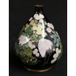 Nicely decorated Japanese silver wire cloisonne vase of squat pear shape, the black ground profusely