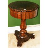 Victorian circular rosewood work table with gadrooned edge and shaped apron,