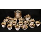 Victorian thirty seven piece gilt porcelain part tea service, the reserve with birds and flowers