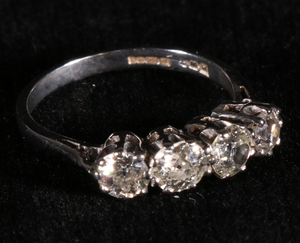 18ct white gold four stone diamond ring, the two central brillant cut stones approx 4.5mm dia.