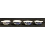 Set of four Chinese 19th century blue and white tea bowls decorated with landscape scenes 7cm